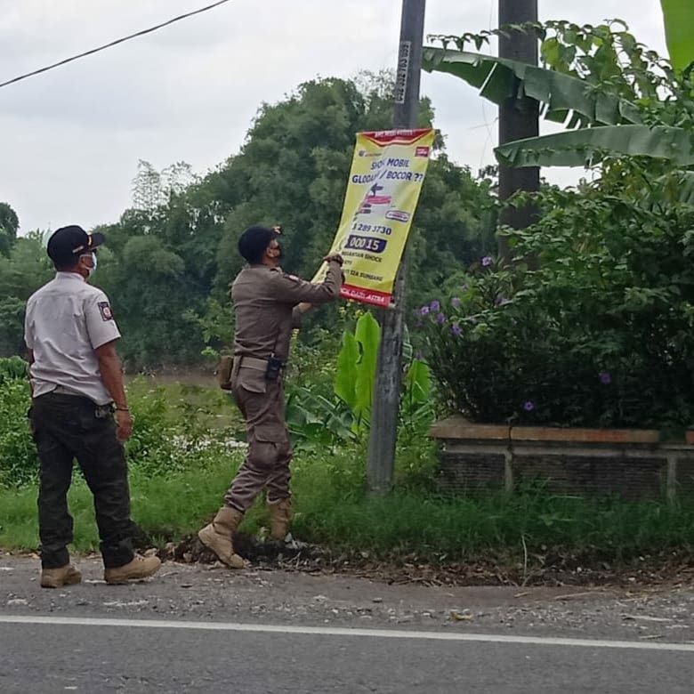 PENERTIBAN SPANDUK/BANNER YANG MENYALAHI ATURAN